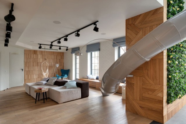 Childhood fantasies come true modern apartment with a slide  6