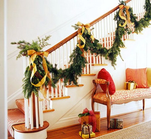 Give the traditional staircase evergreen swag a burst of fresh color with gorgeous yellow ribbons.