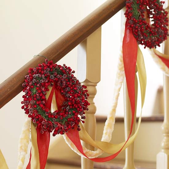 Put wreaths on display beyond the front door. For example, on a stairway.