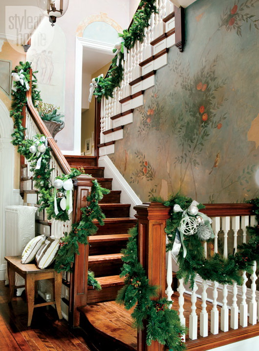 Loosely swagged pine ropings could be used on any staircase. Don't forget to add some details to them starting with ornaments.