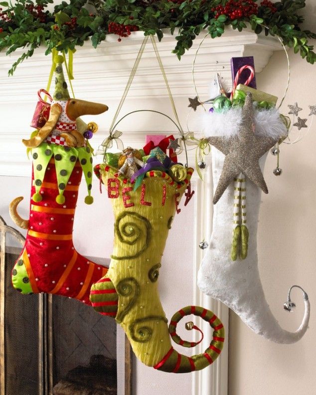 Crazily colorful elf shaped stockings with bright decor, detailing and appliques for a bright and fun touch in the space