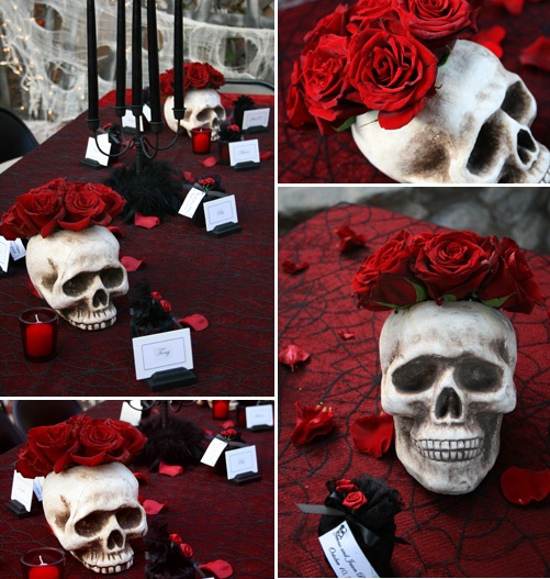 refined red and black Halloween styling with a red tablecloth, roses, black candles and skulls is edgy