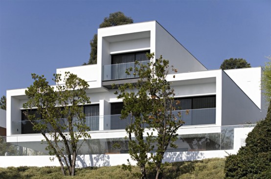 White Concrete Three-Storey House – CS House by Pitagoras Arquitectos