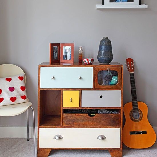 Mid-century inspired storage could look great. Mixing colors could make it to stand out.