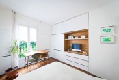 colorful-apartment-with-a-multi-functional-wall-unit-11