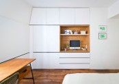 colorful-apartment-with-a-multi-functional-wall-unit-12