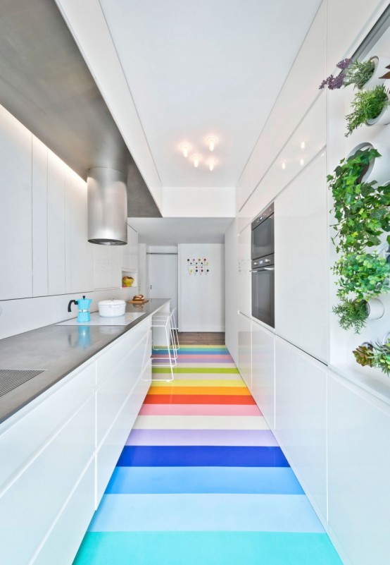 Colorful Apartment With A Multi Functional Wall Unit