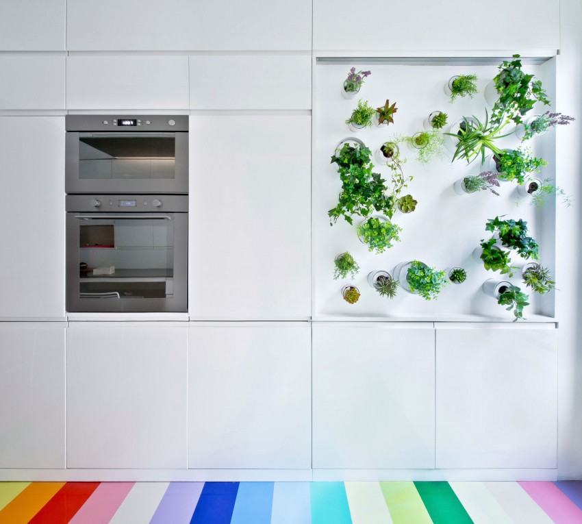 Colorful apartment with a multi functional wall unit  7