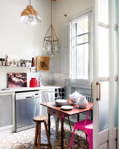 a neon pink chair and a red jar spruce up this boho meets industrial kitchen