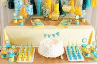 colorful dessert table for a gender neutral baby shower