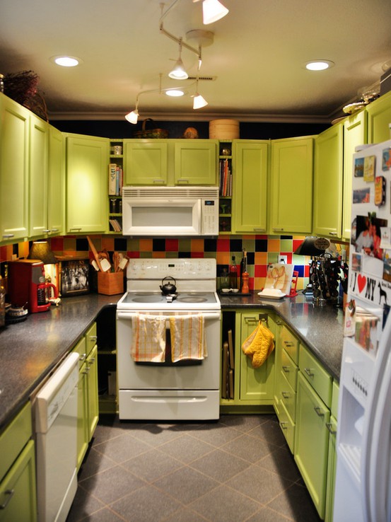 a bold lime green kitchen with a colorful tile backsplash and vintage appliances is a super bold and cool space