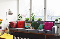 colorful mid-century living room with Stockholm rug