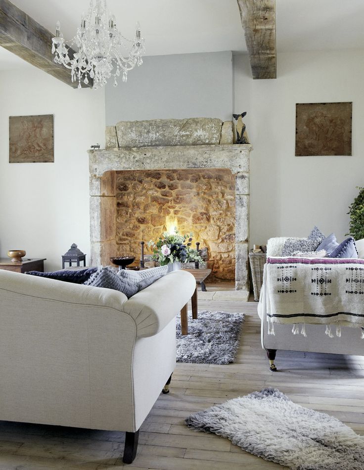 Old wood beams can draw the eye to the ceiling even in such gorgeous, airy and cozy space.