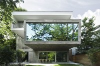 concrete-modern-house-made-of-several-stacked-volumes-1