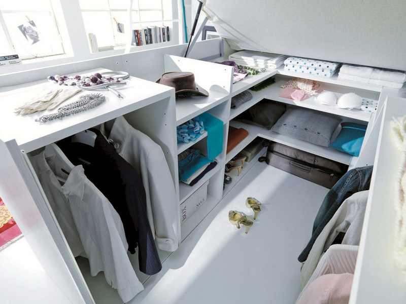Container bed with a closet hidden underneath  6