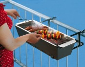 a small metal grill can be attached to the railing and can be used anytime you want – it’s a very smart and cool idea for a tiny balcony