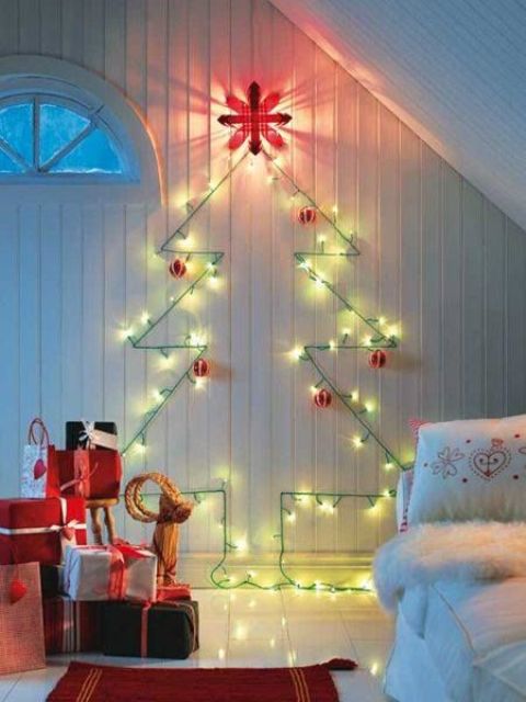 a bright and shiny Christmas tree of green lights and red ornaments and stacks of gifts on the floor will make your kids' room very festive