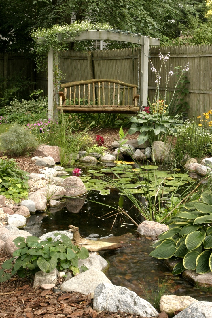 A swing arbor is one of those things you can build near a pond to help you admire it.