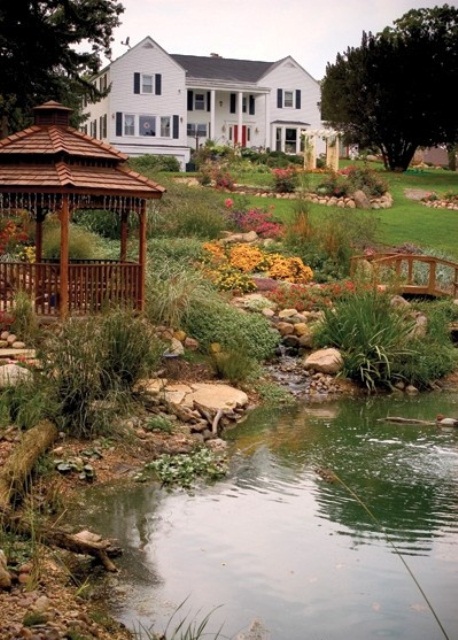A large pond could look like a lake. Just don't forget to add a gazebo near it. It's a perfect place to admire the nature around.