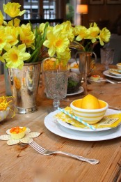 refined vintage metallic vases with daffodils will be always a cool idea for decorating your table for spring