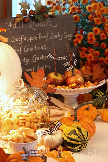 Decorate your fall kitchen with bright faux pumpkins or gourds, it's a durable and non expensive idea