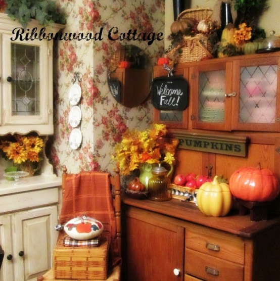 fall leaf and bloom arrangements, faux pumpkins and porcelain ones for decorating a fall kitchen or dining space