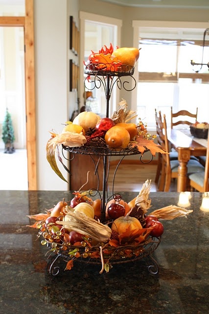 A wire stand with fall harvest and foliage is the most natural fall like decoration for your kitchen