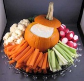 used a pumpkin instead of a bowl and fill it with dip placing fresh veggies all around