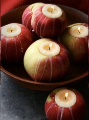 fall apples as candleholders is a genious and very seaosnal idea, make as many as you want