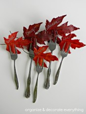 forks with fall leaves and names are a creative and bold idea for place cards and fall tablescapes