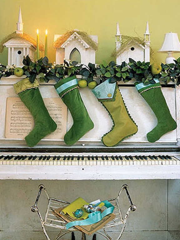 green and neon green stockings paired with greenery and green apples are amazing decor for Christmas, they look cool