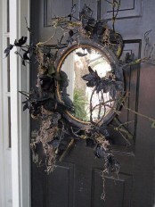 an awesome vintage front door halloween decor