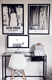 a practical black and white home office with an IKEA desk