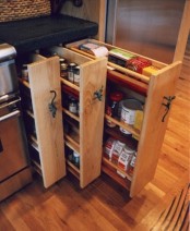 a small cabinet can hold several vertical drawers to store more stuff, which is great for a small kitchen