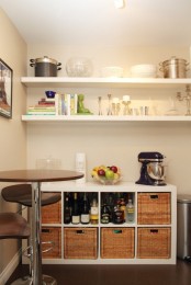 open shelving is always a good idea and you can pair it with a kitchen island with lots of woven drawers for storage
