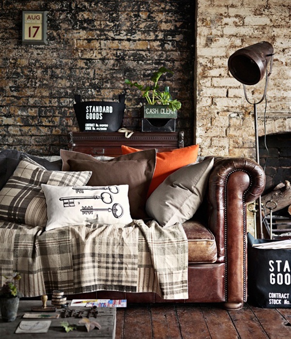 A combo of light colored and dark colored brick makes the living room textural and catchy giving it a masculine feel