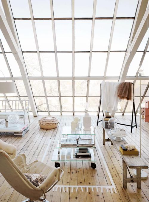 Gorgeous loft space with the whole wall covered with windows.