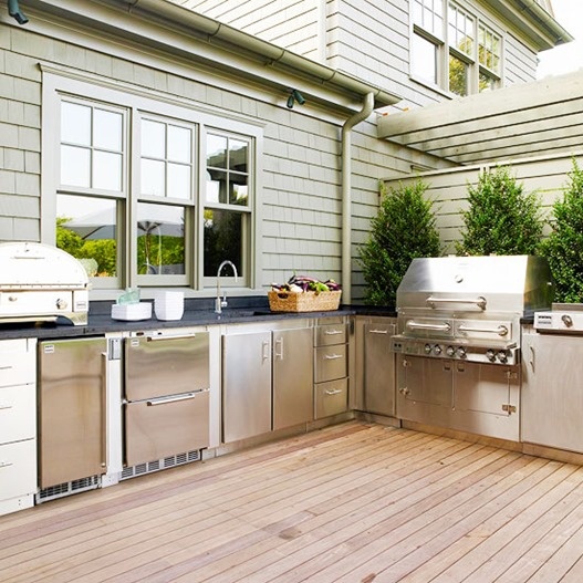 A lot of manufacturers sell nice but pricey contemporary outdoor kitchen sets that could could solve all your cooking needs.