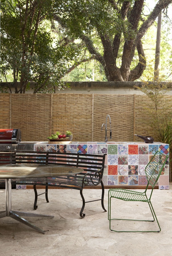 Here is an awesome idea to use different patchwork tiles to make your outdoor kitchen more interesting and fun.