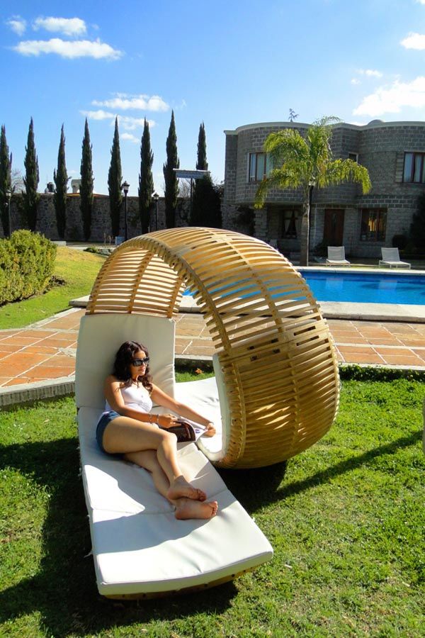 A unique swirling double lounger made of plywood is a cool modern idea that catches an eye and looks super bold