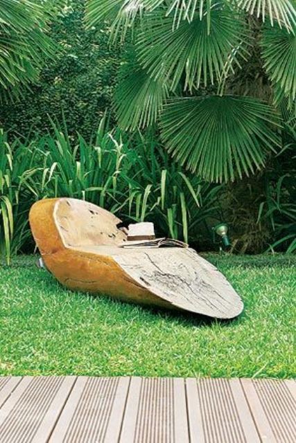 A single wood piece lounger is a very natural and fresh idea   it will fit a tropical, natural and just minimalist backyard