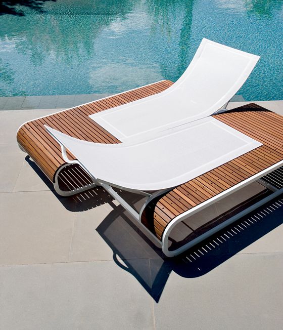 Ultra minimalist loungers made with metal frames, plywood and sleek white backs are perfect for an ultra minimalist space