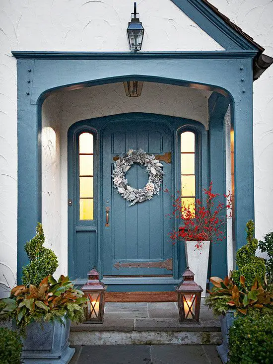 If your front porch is small but wide enough you can put some decor on both sides of it.