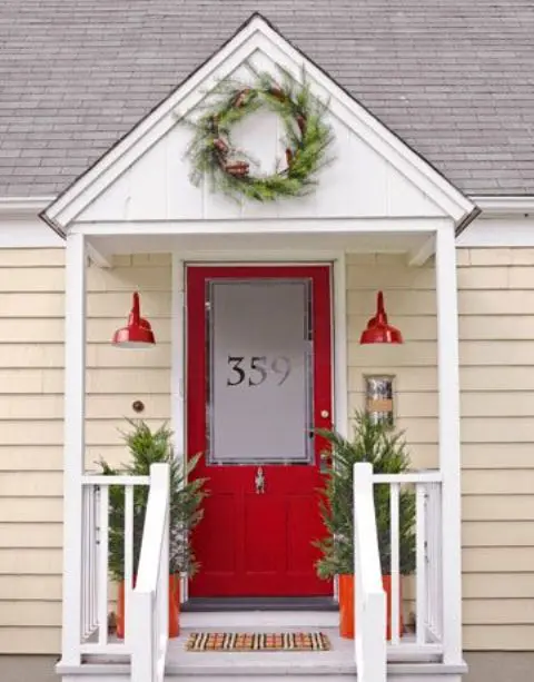 If your front door is red then you might want to get light fixtures and planters in the same color.