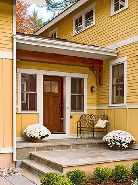 Flowers is a perfect addition to a front porch decor.