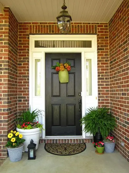 You can not only grow flowers in planters but also put them in a door wreath.