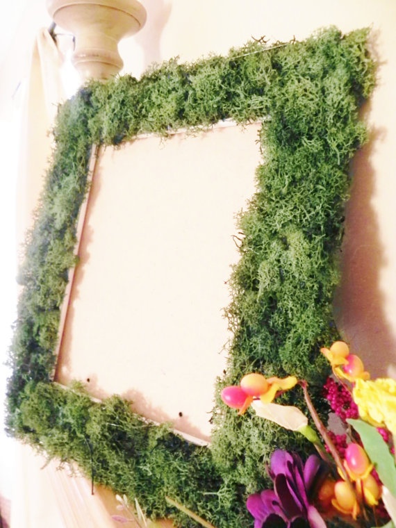 Cover an artwork or a mirror with moss to make it look more spring like and outdoorsy