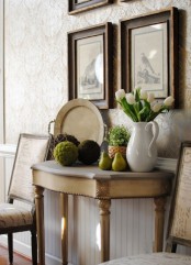 a cool moss centerpiece for a spring console table decor