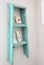 a charming ladder used as a wall shelf