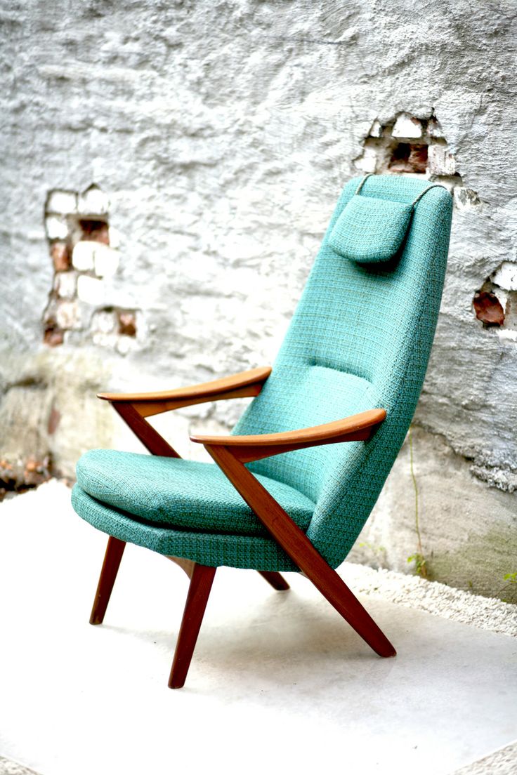 A mid century modern turquoise chair like this one will add elegance and color to your room and will be a timeless solution for any space